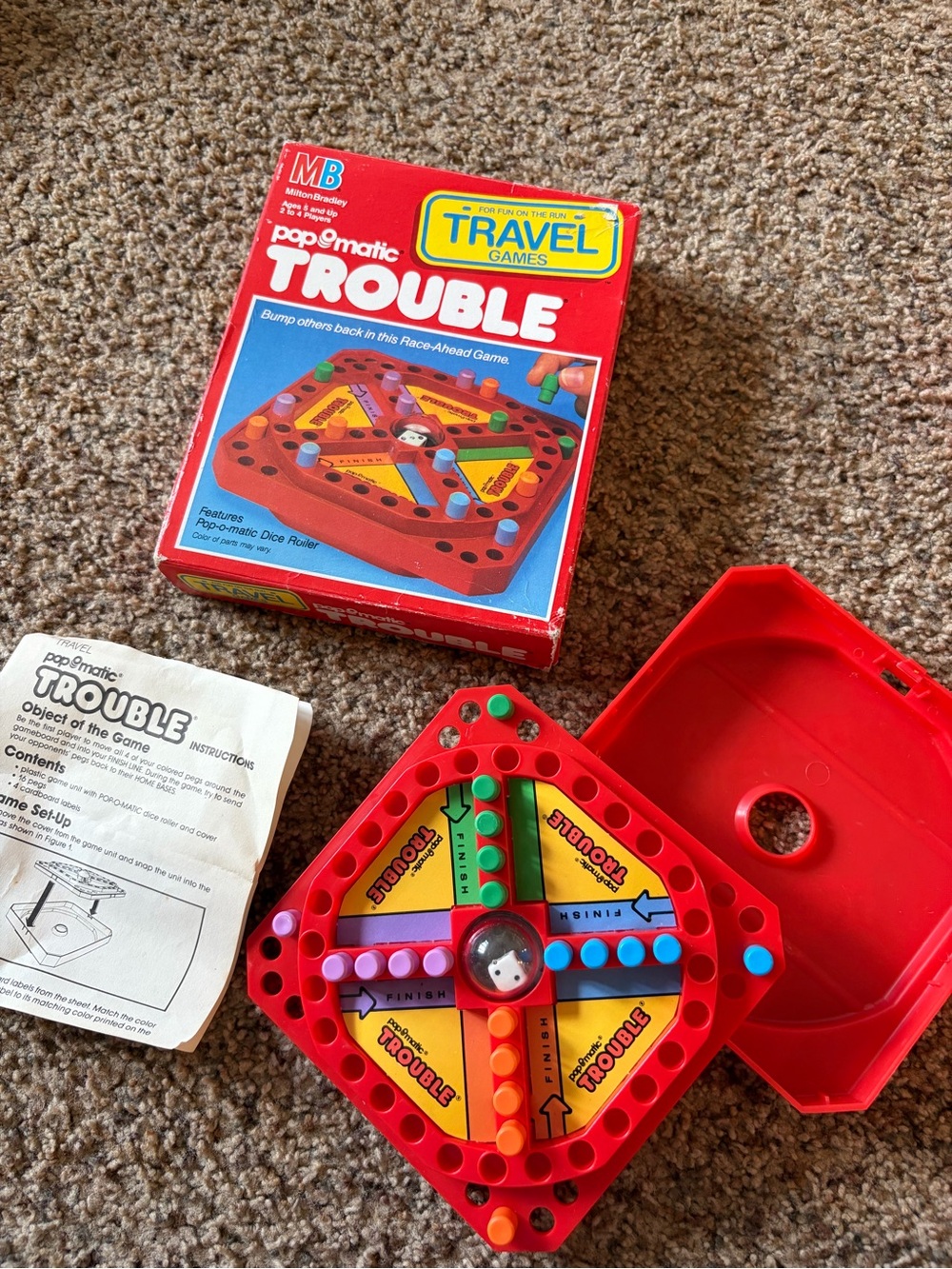 MB Games Pop-O-Matic Travel Trouble Board Game - Red